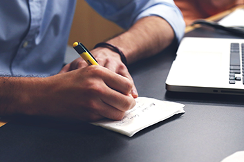 Man signing up for Employee Benefits in Lake Success